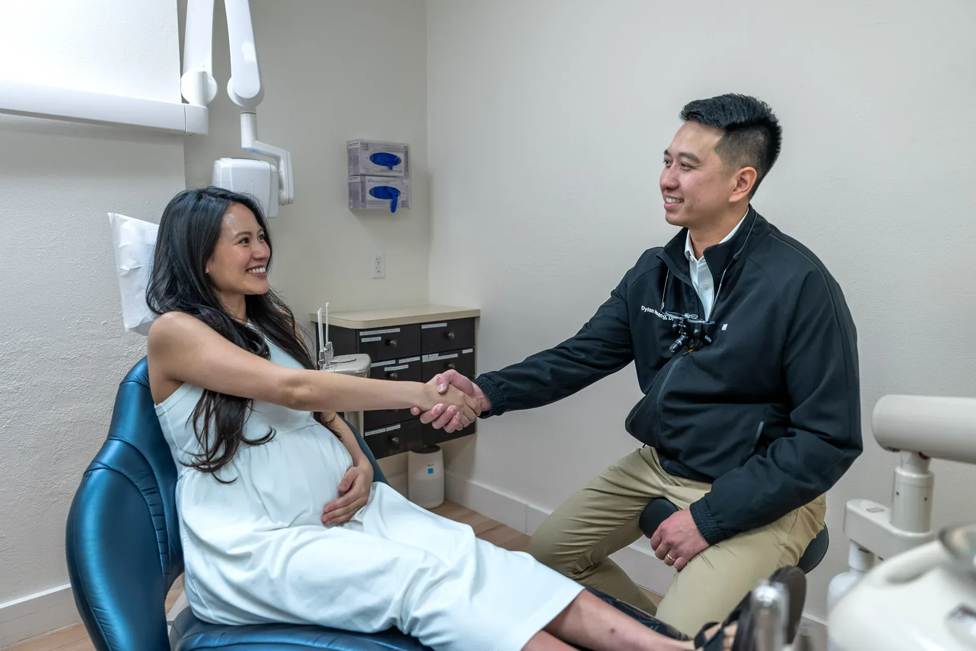 Dr. Dylan Hoang greeting a cosmetic dentistry patient at Colorado Dental Spa in Golden, CO