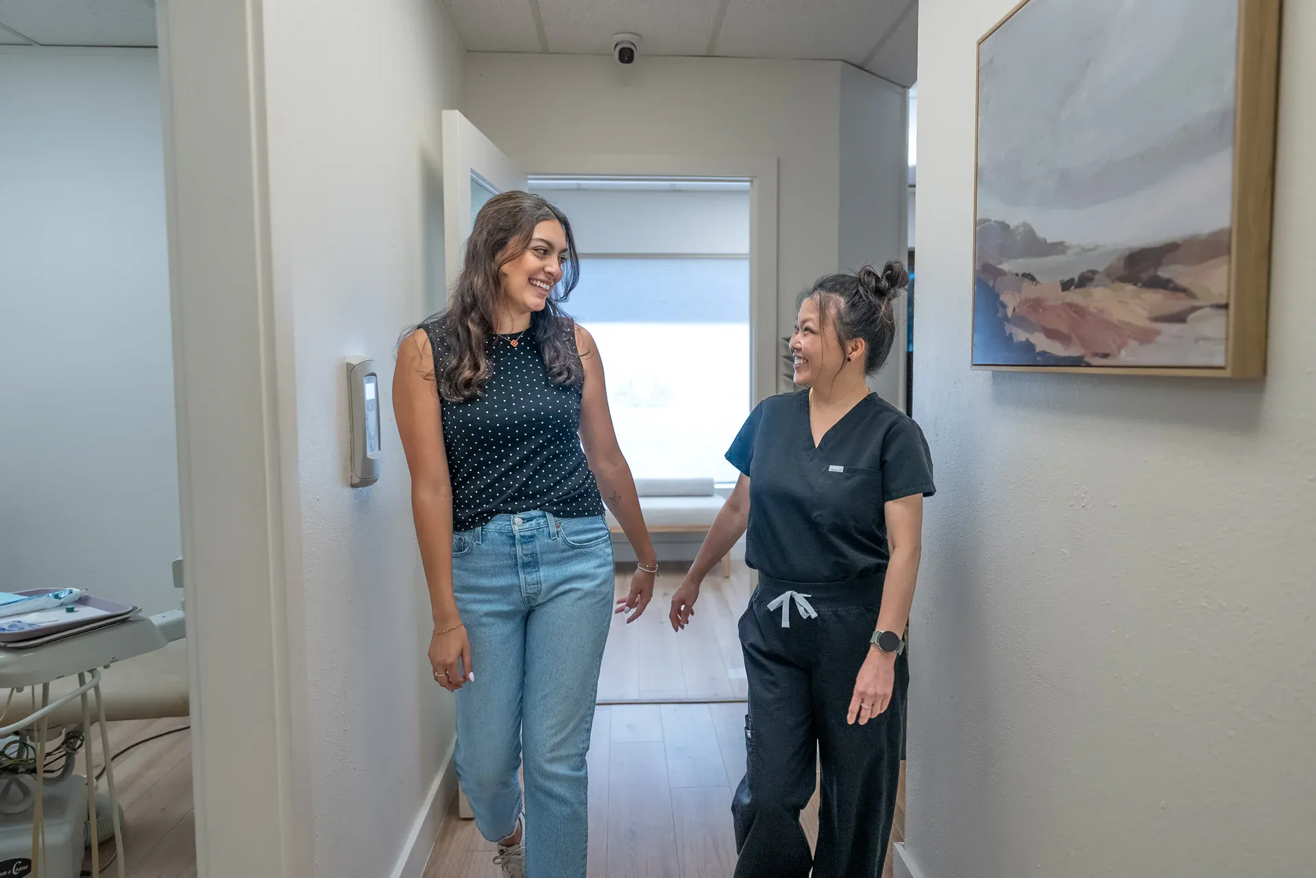 A Colorado Dental Spa team member walking a patient back for their appointment in Golden, CO